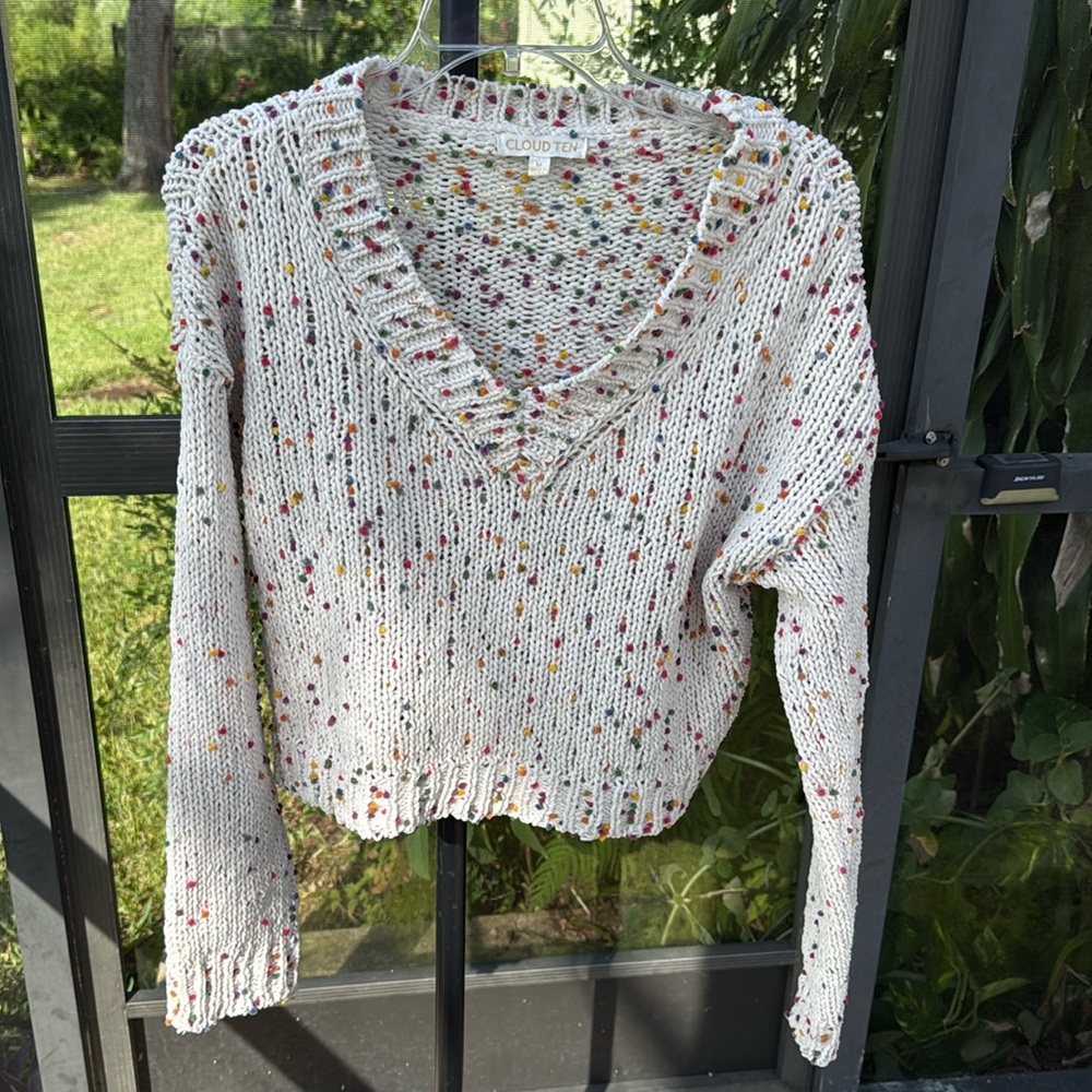 CREAM SOFT KNIT CROP SWEATER W/ SPLASHES OF RAINBOW COLORS & DISTRESSING medium